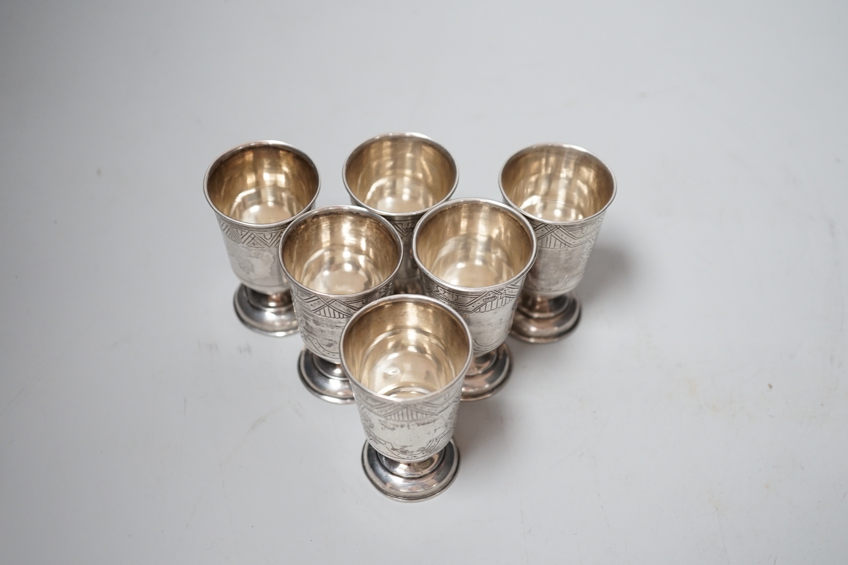 A set of six late 19th century Russian 84 zolotnik white metal pedestal tots, 65mm, 6.1oz.